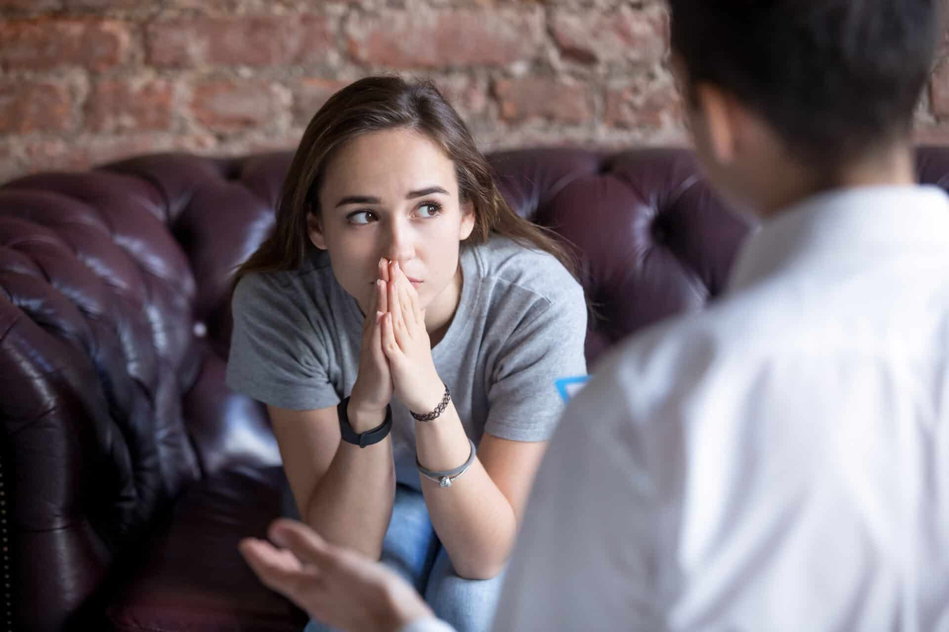 Young woman visiting therapist counselor at a marlton addiction treatment program