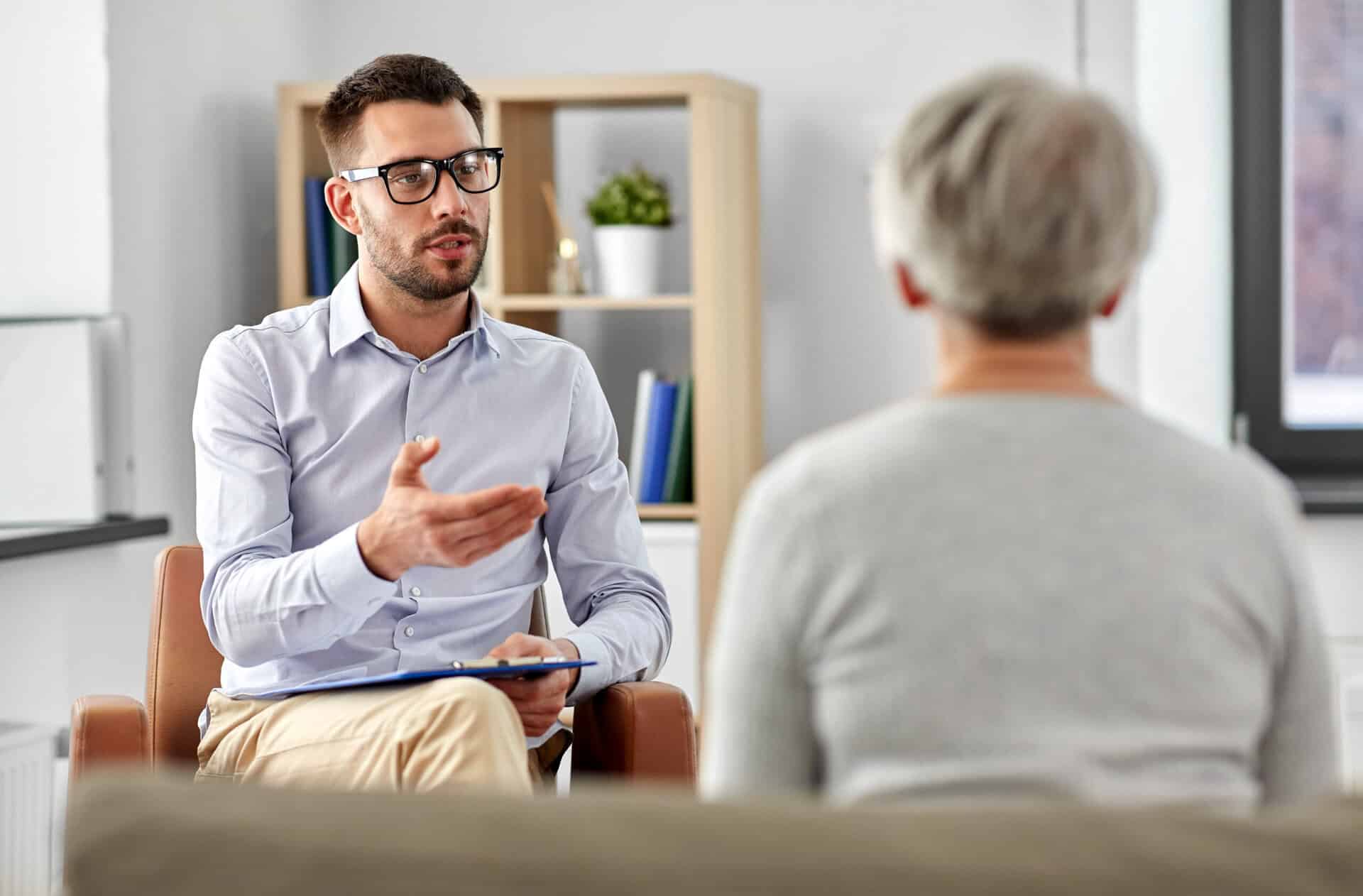 Counselor discussing Relapse Prevention Strategies with a client